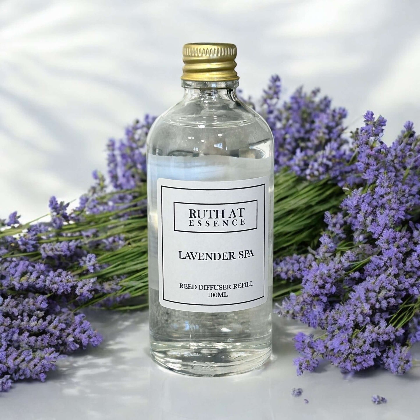 Lavender Spa Reed Diffuser Refill 100ml with lavender flowers, handmade, vegan friendly, soothing fragrance.