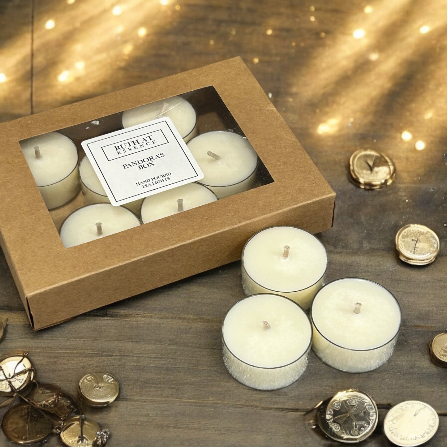 Handmade Pandora's Box tea lights in a stylish gift box, vegan friendly candles providing enchanting aromas.