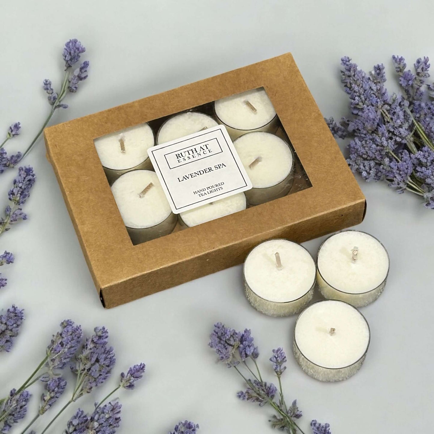 Handmade lavender spa tea lights box with 9 candles, vegan-friendly, perfect for relaxation and soothing ambiance.
