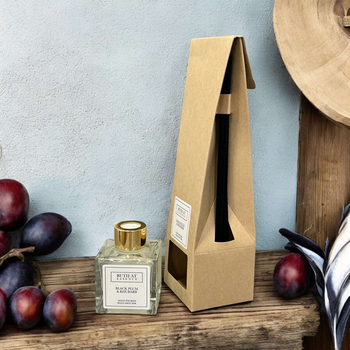Handmade Black Plum & Rhubarb reed diffuser 100ml in elegant packaging, vegan friendly home fragrance.