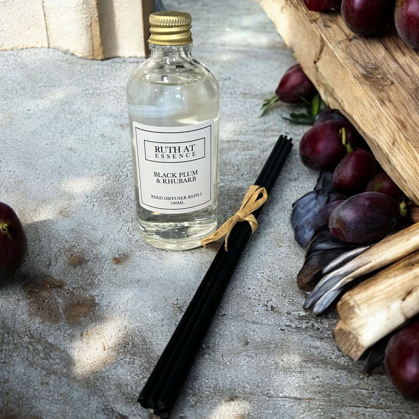 Handmade 100ml Black Plum & Rhubarb reed diffuser refill with new reeds, vegan friendly scent for a fresh home ambiance.