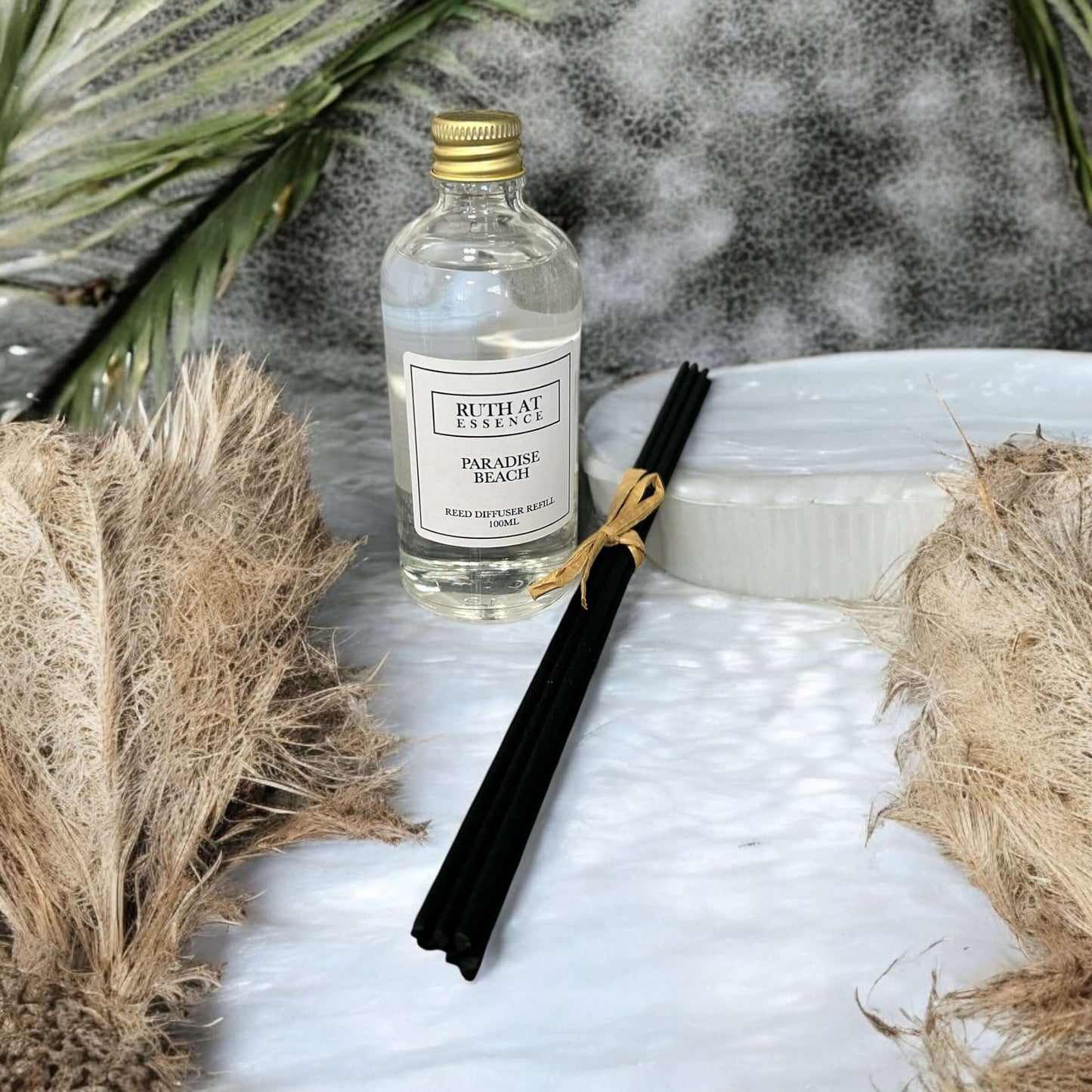 Paradise Beach diffuser refill 100ml with black reeds, vegan friendly, handmade scent evoking beach relaxation.