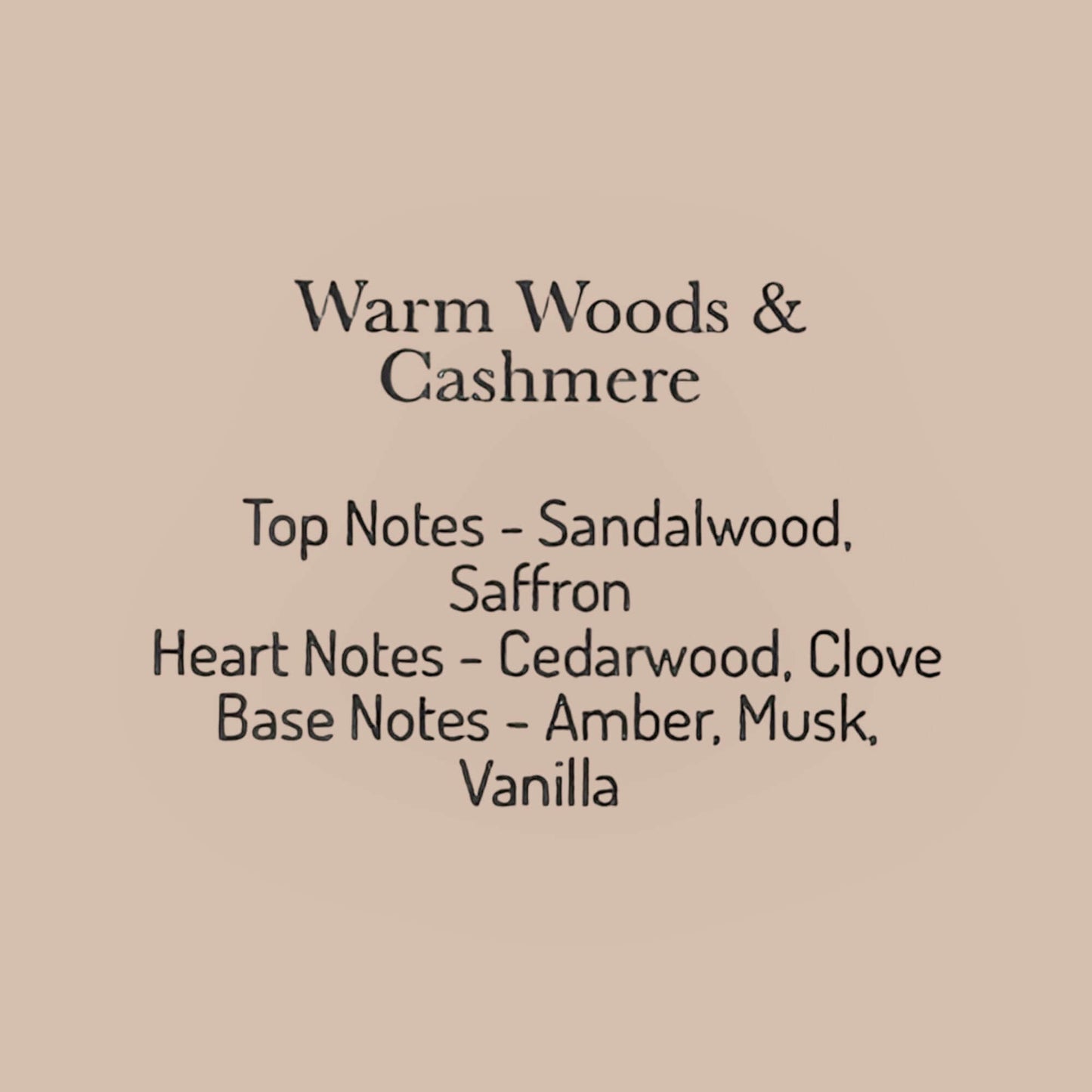 Warm Woods & Cashmere fragrance notes including sandalwood, saffron, cedarwood, clove, amber, musk, and vanilla.