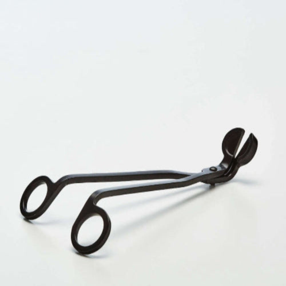 Handmade wick trimmer for candles, ensuring cleaner burns and longer-lasting fragrance, vegan-friendly design.