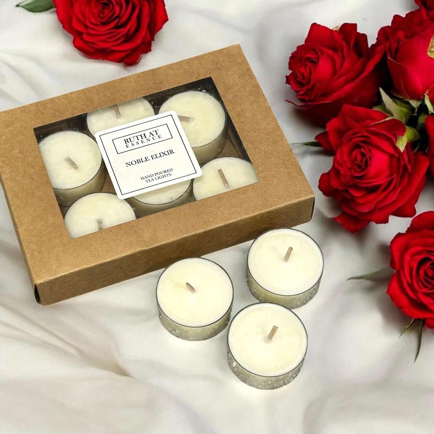 Handmade Noble Elixir tea lights box with 9 candles, vegan friendly.