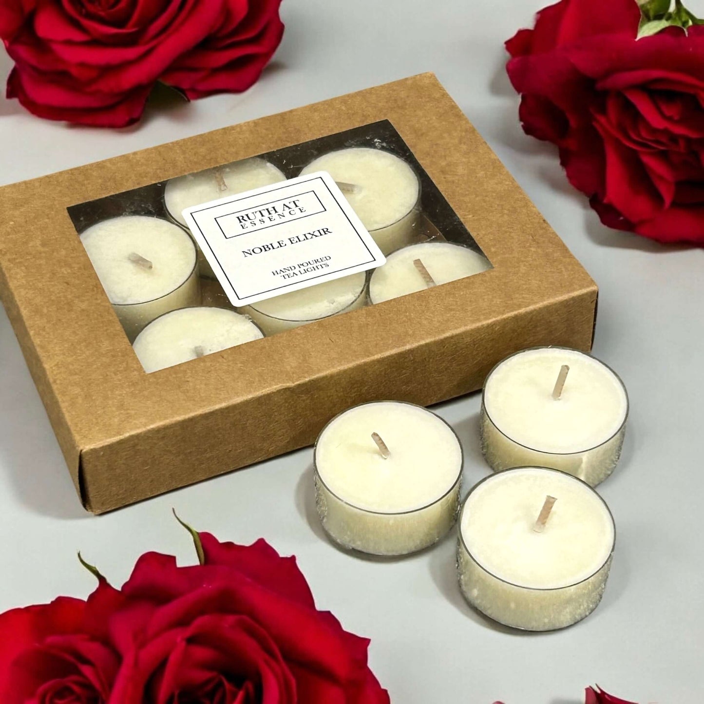 Handmade Noble Elixir tea lights box with 9 vegan-friendly candles.