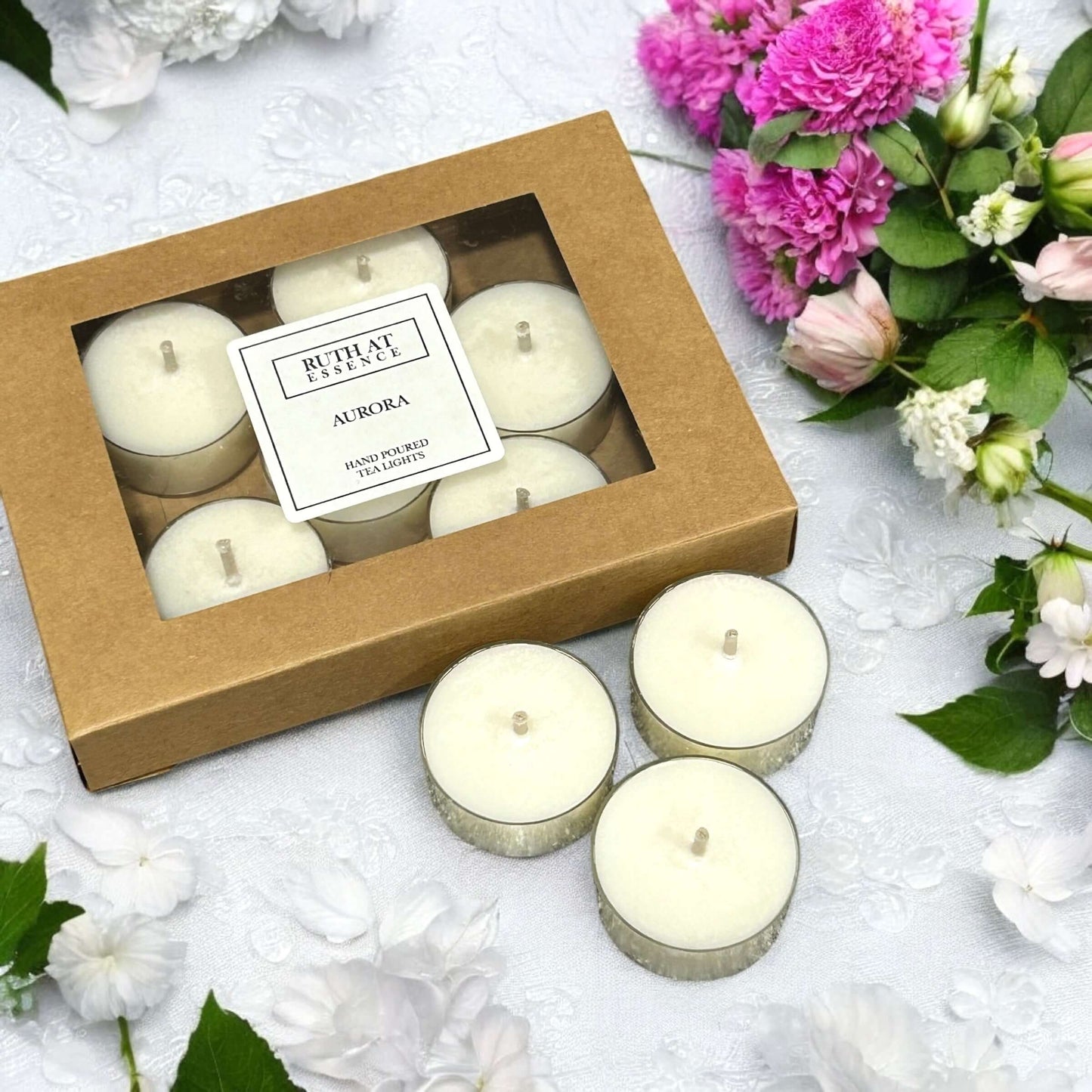 Handmade Aurora tea lights box featuring 9 vegan-friendly candles with floral scent.
