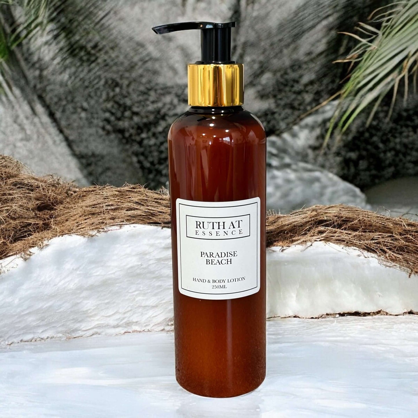 Paradise Beach Hand & Body Lotion 250ml in amber bottle, vegan friendly, with fresh beach scent.