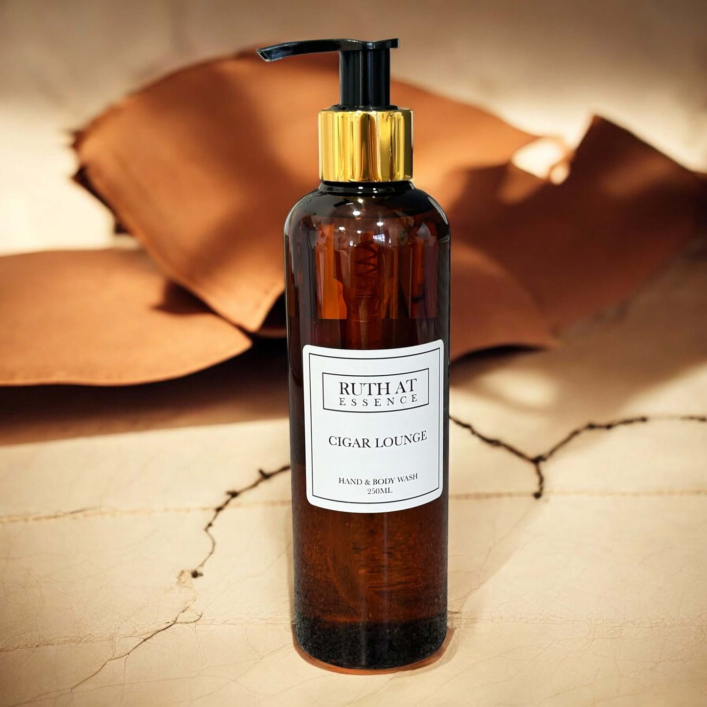 Cigar Lounge Hand & Body Wash 250ml in an elegant amber bottle with a sophisticated label.