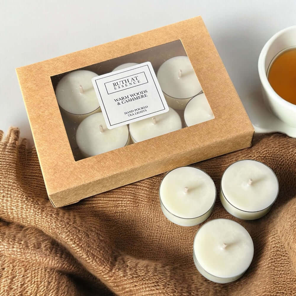 Handmade Warm Woods & Cashmere tea lights box containing 9 vegan-friendly candles, perfect for a cozy ambiance.