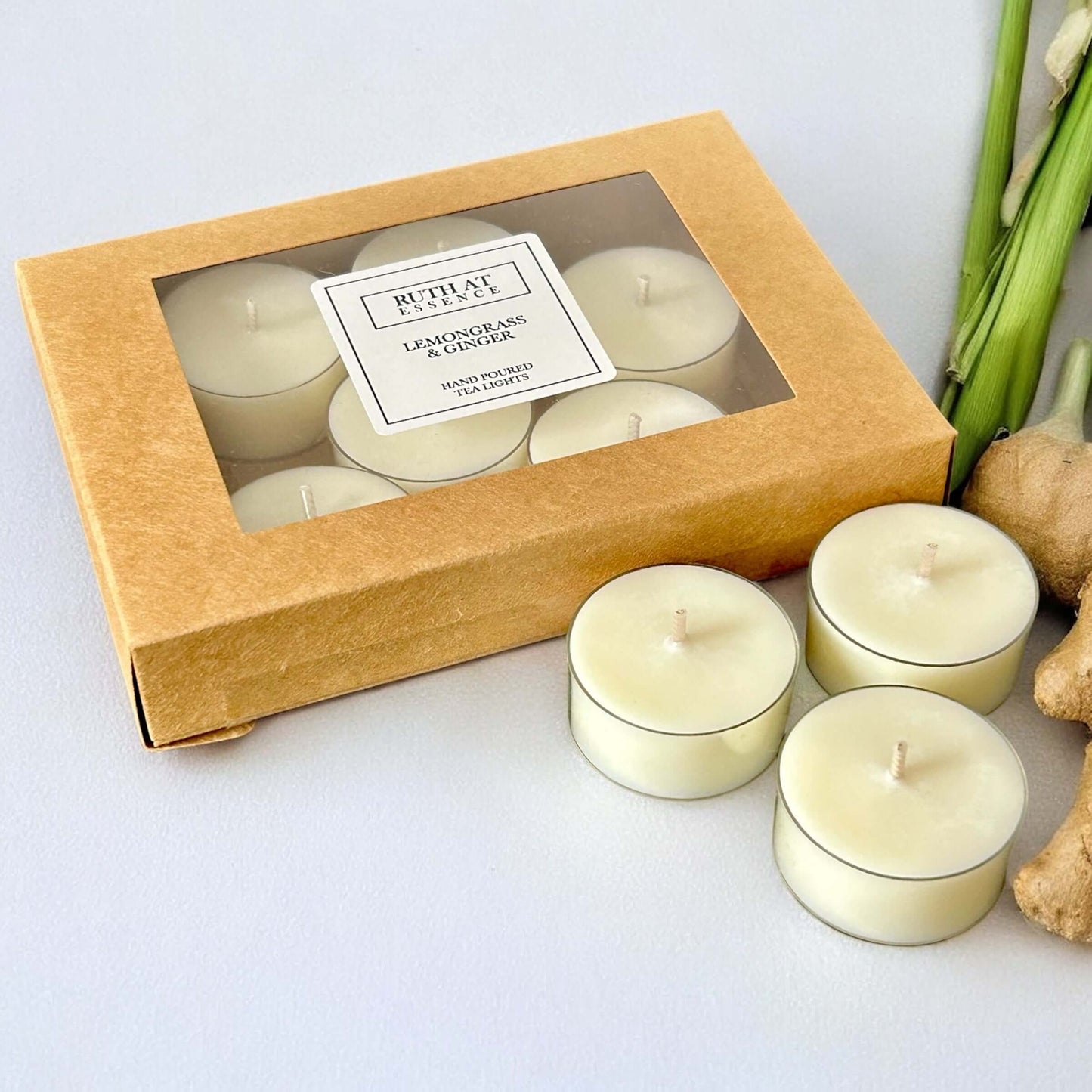 Handmade lemongrass and ginger tea lights box with 9 vegan-friendly candles, showcasing their fresh, aromatic fragrance.