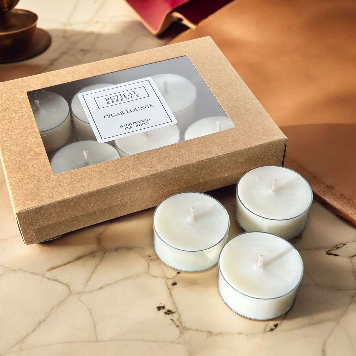 Handmade vegan friendly cigar lounge tea lights box with 9 candles, smoky fragrance, perfect for relaxation.