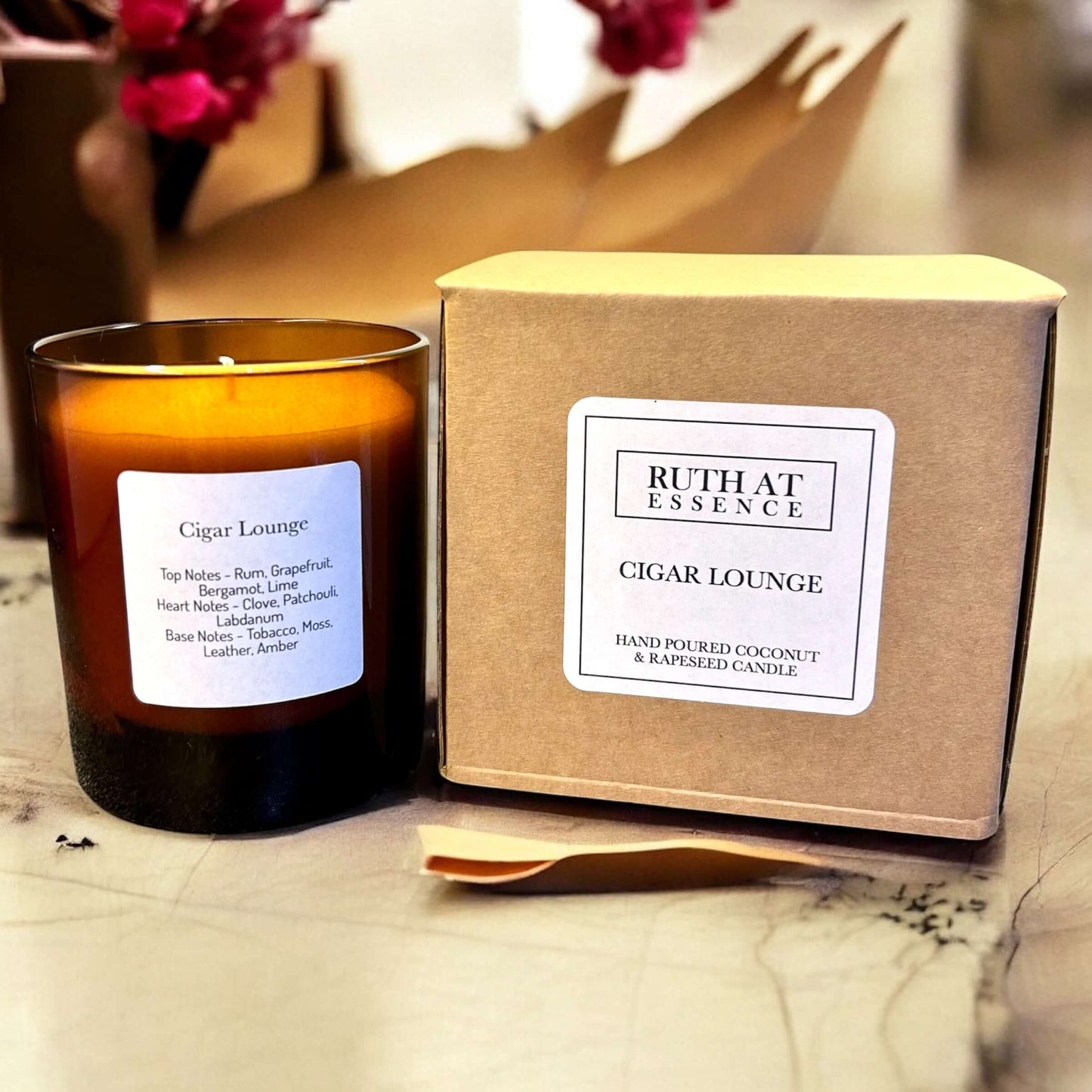 Handmade Cigar Lounge candle in an amber vessel with natural wax, vegan friendly, smoky fragrance, and elegant packaging.