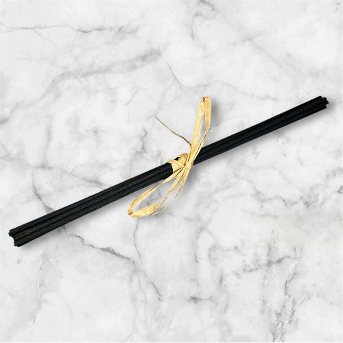 Pack of 8 handmade black replacement fibre diffuser reeds tied with paper ribbon.