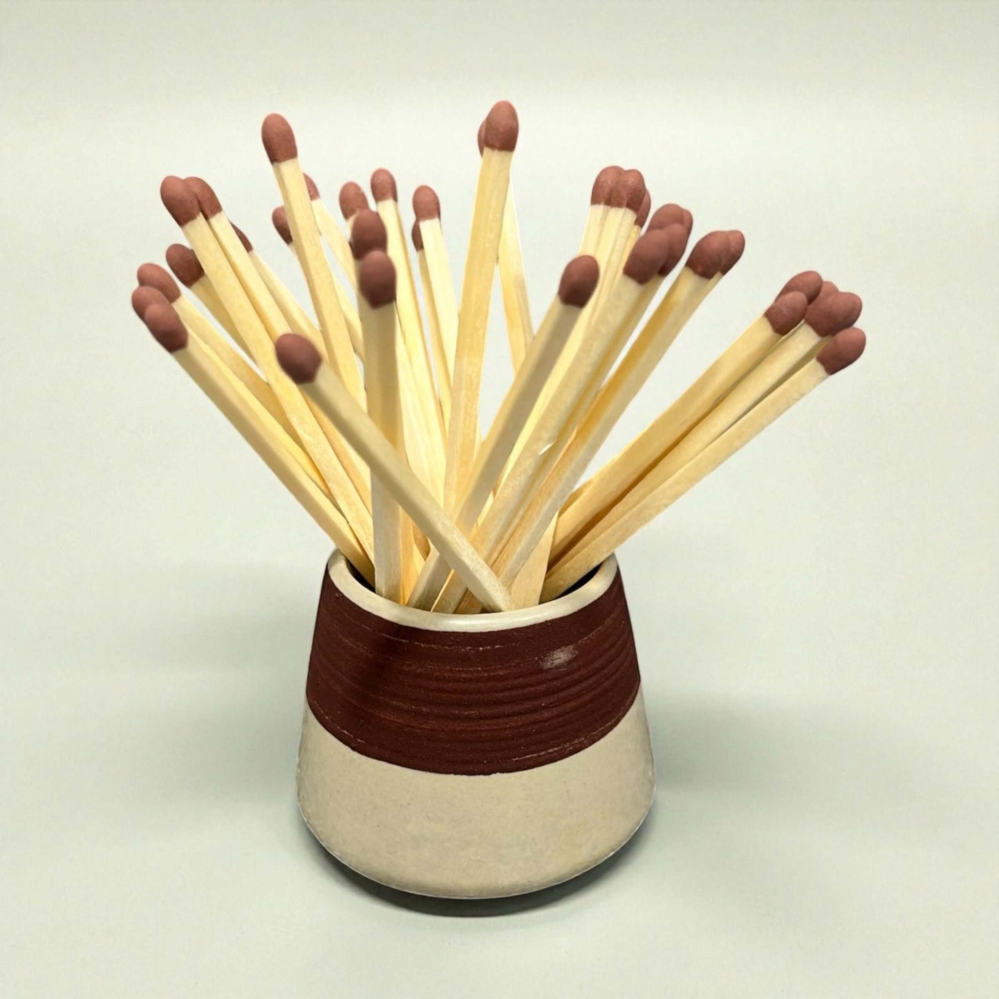 Ceramic Matchstick Holder - Milk with matches arranged inside, ideal for candles and home decor.